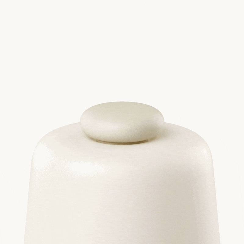 Hatch Baby's top button being pressed